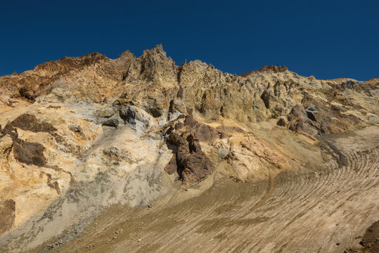 Rocky cliffs around the crater of Mutnovsky volcano, Kamchatka, Russia