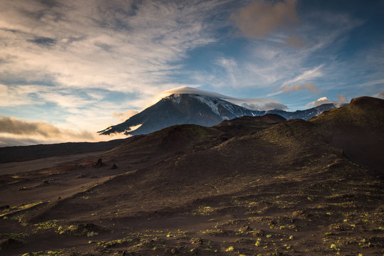 Peaks and slopes of Tolbachik Volcano during sunset, Kamchatka, Russia