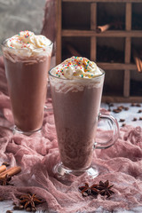 Chocolate milkshake in tall glass mugs 