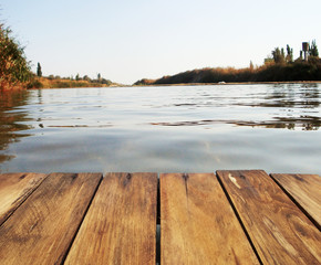 Naklejka na ściany i meble .Fishing on the lake. Fishing on the river. Wooden perspective..
