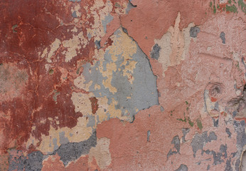 Shabby red paint on the wall