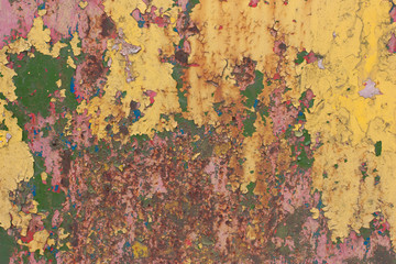 Rusty, with multi-colored peeling paint  background