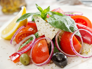 Greek salad with feta cheese slice