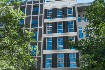 townhouses at berlin framed with green trees
