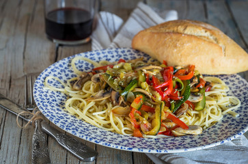 Spaghetti and tomatoes with herbs