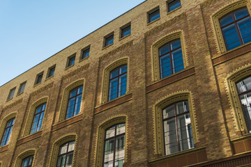 Fototapeta na wymiar old brick facade of historical building