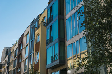 townhouses with big blue windows