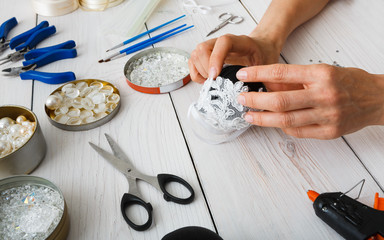 Creative diy craft hobby. Handmade christmas decoration, balls and garland