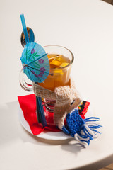 hot cocktail with lemon and scarf
