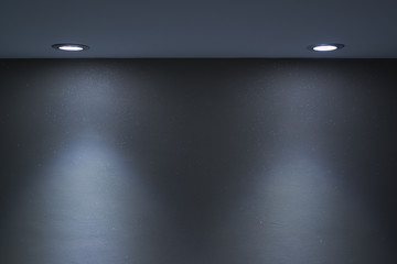 Interior wall and spotlight as background