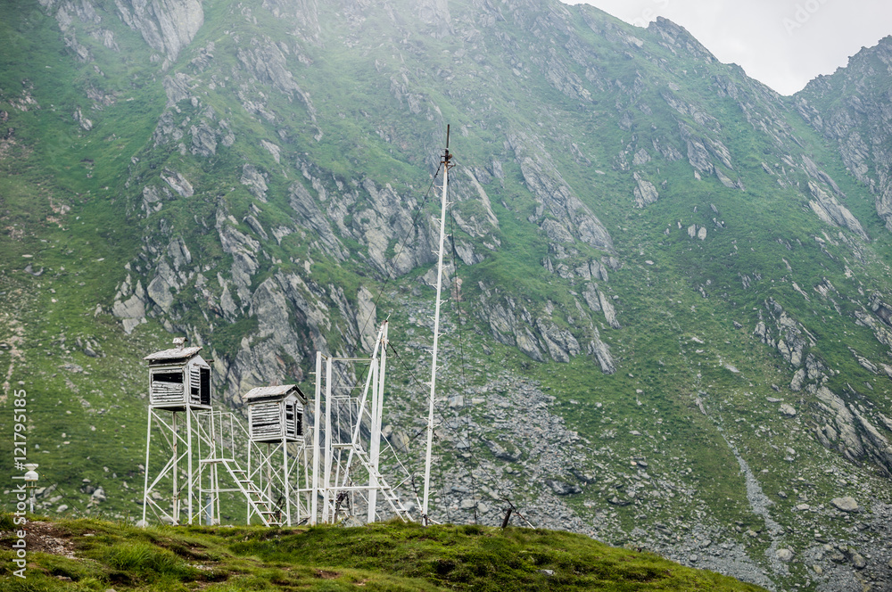 Wall mural Weather station near Balea Lake next to Transfagarasan Road in southern section of Carpathian Mountains in Romania