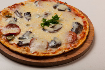 pizza on wooden cutting board