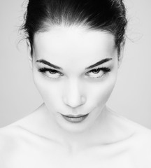 Fototapeta premium Beautiful woman face. Mascara Applying.Eyes Make-up. Beautiful S