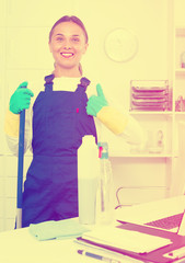 Girl cleaning at company office