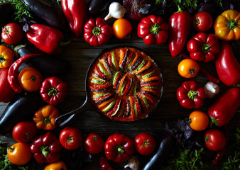 Traditional homemade vegetable ratatouille baked in cast iron frying pan healthy diet french...