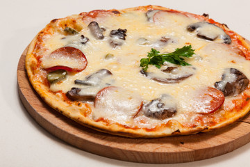 pizza on wooden cutting board