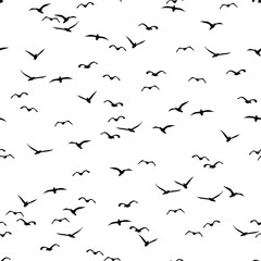 Seamless pattern of a flock of flying birds