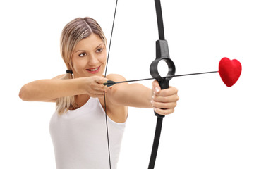 Naklejka premium Girl aiming with a bow and a love arrow