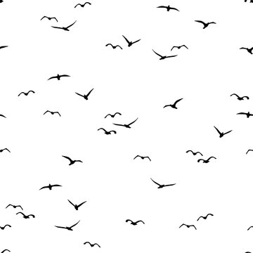 Seamless pattern of a flock of flying birds