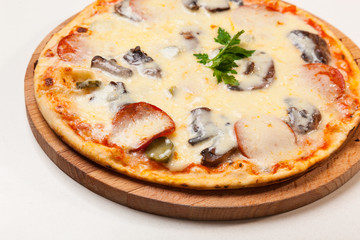 pizza on wooden cutting board