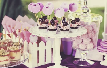 Rolgordijnen Sweet holiday buffet with cupcakes and tiramisu glasses © lena_serditova