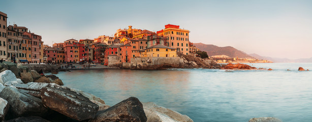 Sunset in Boccadasse bay, Italy, Genoa panorame image - obrazy, fototapety, plakaty