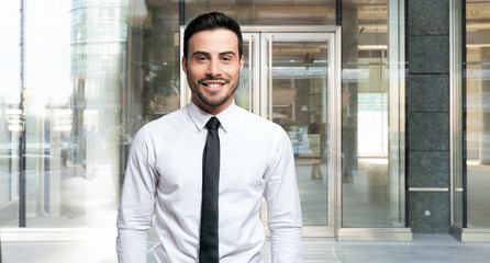 Smiling young businessman portrait