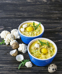 Italian cauliflower with quail eggs, arugula and spices