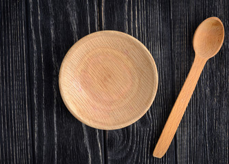 Wooden plate and a wooden bowl (top view)