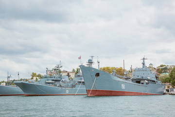 Black Sea Fleet warships are on the quay of the Sevastopol Bay. The view from the excursion boat.