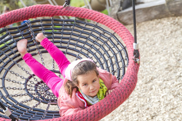 Challenging playground installation with nests and ropes for chi