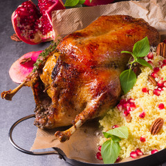 Duck with millet and pomegranate