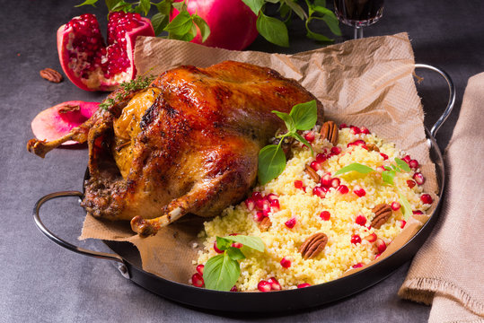 Duck with millet and pomegranate