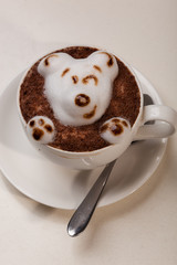 Coffee with foam in the form of dog head