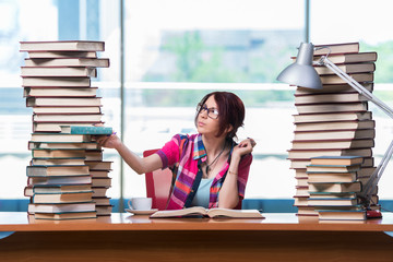 Young female student preparing for exams