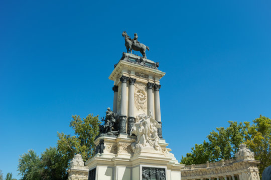 Monument of Alfonso XII Detail, The Peace and The Progress sculpture groups, Pond of the Park of the Pleasant Retreat, Madrid, Spain