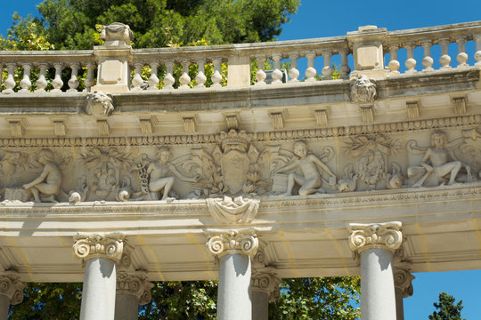 Colonnade Sculpture Group Detail - Monument of Alfonso XII, Pond of the Park of the Pleasant Retreat, Madrid, Spain