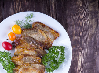 Juicy steak with spices and vegetables . Juicy portions of grill