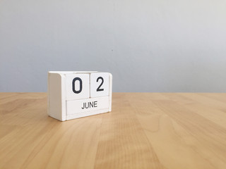 June 2nd.June 2 white wooden calendar on vintage wood abstract b