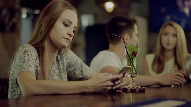 lonely woman in a bar