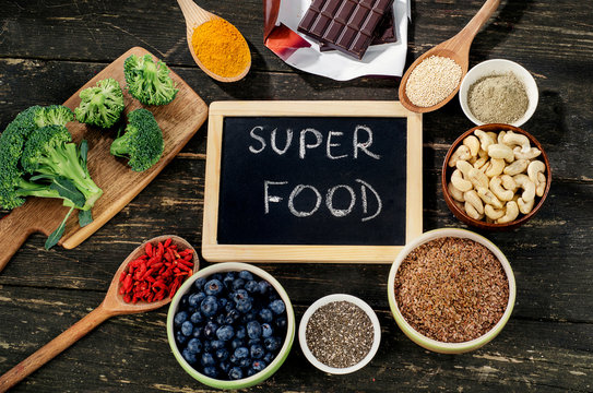 Super foods on a rustic background.