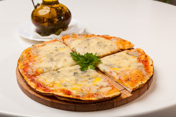 pizza on wooden cutting board
