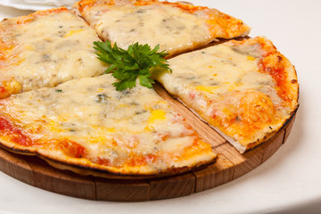 pizza on wooden cutting board