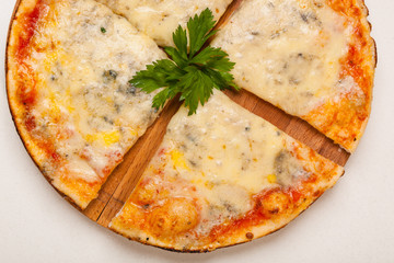 pizza on wooden cutting board
