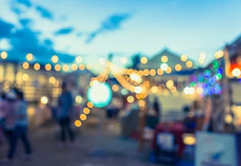 Fotobehang blur image of night festival on street blurred background with b © coffmancmu