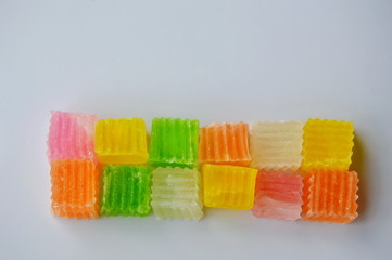 colorful crispy candy on white plate