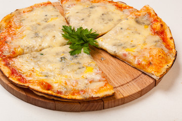 pizza on wooden cutting board