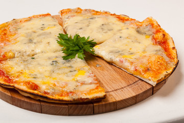 pizza on wooden cutting board