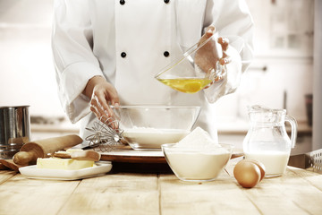 cook in kitchen interior 