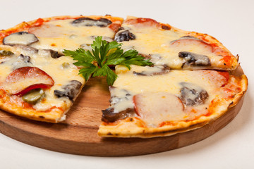 pizza on wooden cutting board